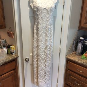 Size 6 ivory Marisa wedding dress in perfect condition. Worn once.